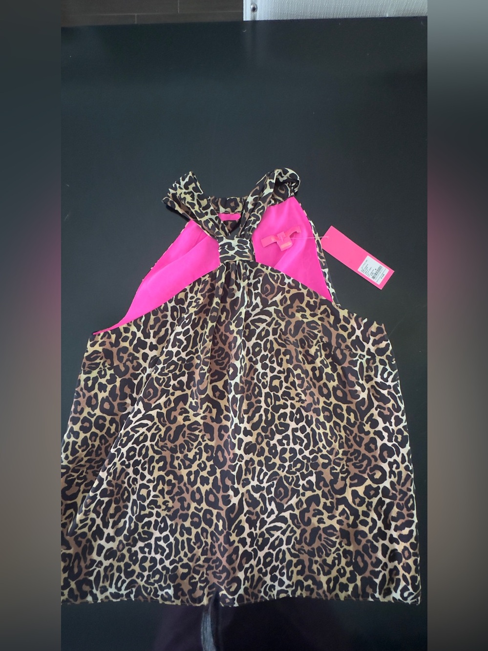 Lilly Pulitzer Caden Top featuring a classic leopard print & Pink Lining. Size M - Picture 2 of 8